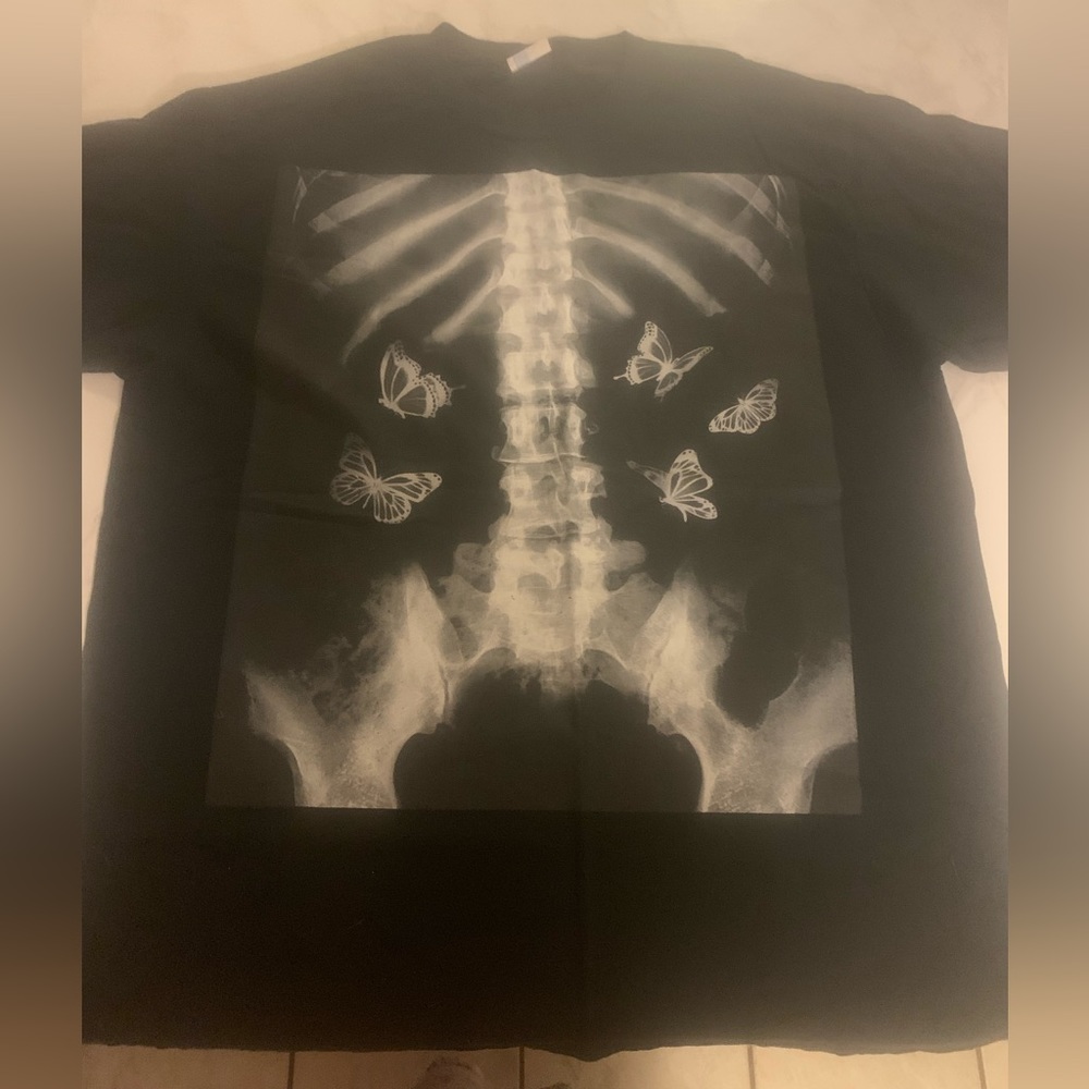 Black t-shirt with chest /body x-ray with butterflies